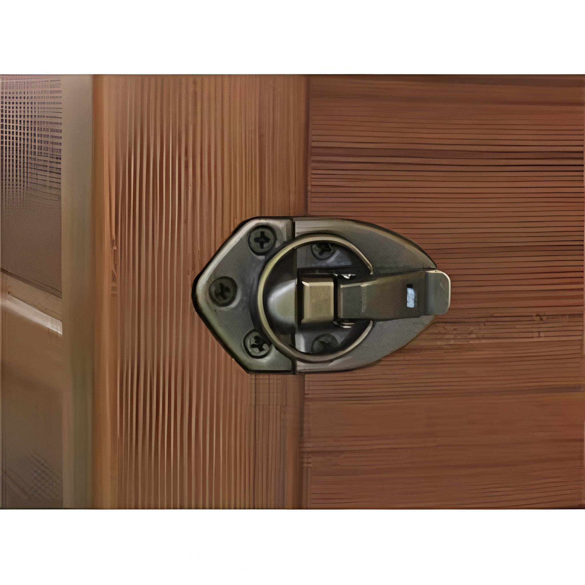Close-up of a wooden door with a brass latch in a sauna